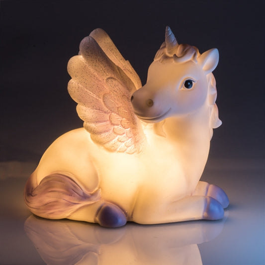 a figurine of a white unicorn with wings